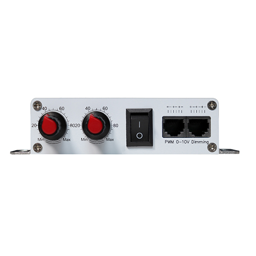 Koray DM25-2H dual-channel tunable-spectrum 1-10V dimming control interface on a white background: a small rectangular control module with two channel dials and RJ11/RJ12 telephone sockets